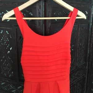 Eva Franco orange pleated dress